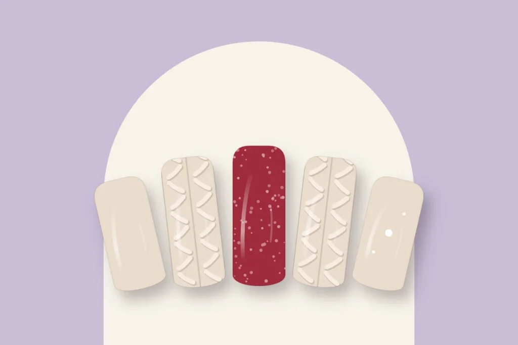 Manucure mixte : crème uni, effet pull crème, rouge velours et petits points blancs